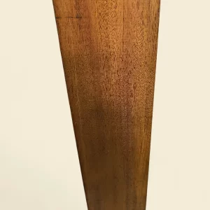 Mahogany guitar neck blank on linen backdrop