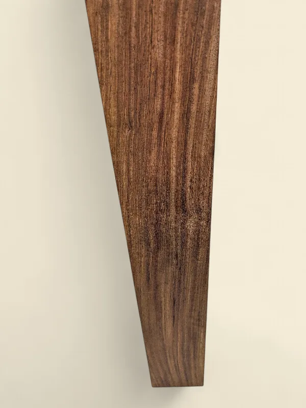 Burmese Padauk dressed board on linen backdrop