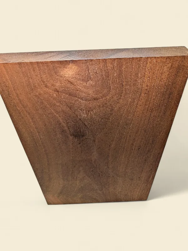 Old-growth Khaya Mahogany guitar body blank on linen backdrop