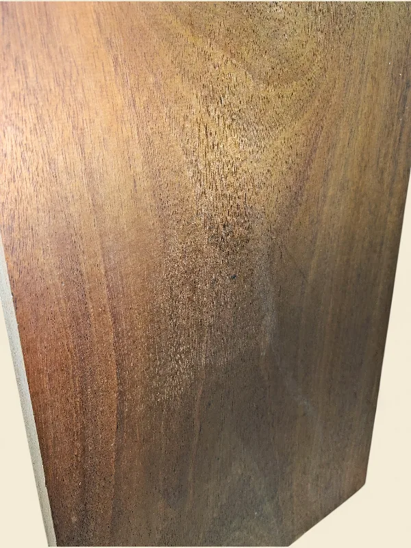 Old-growth Khaya Mahogany guitar body blank close-up showing ribbon figure