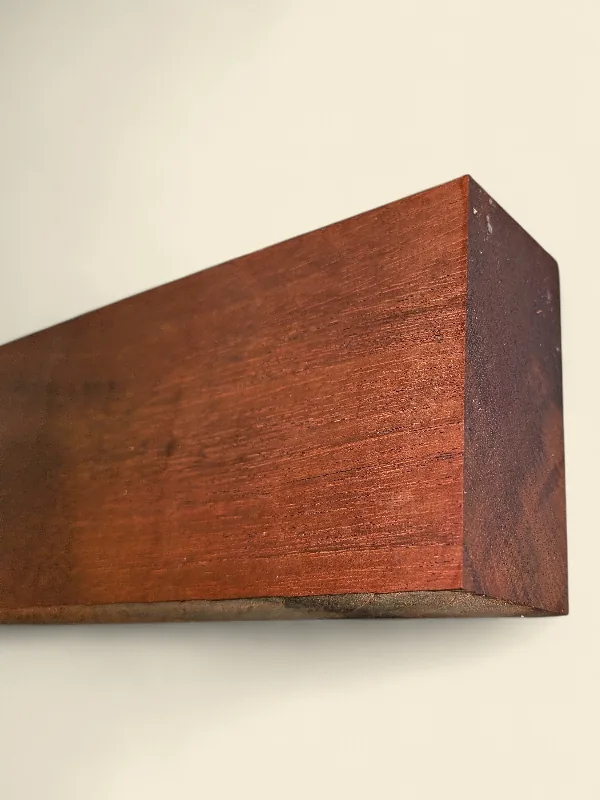 Old-growth Khaya Mahogany guitar neck blank end-on view showing 50mm section