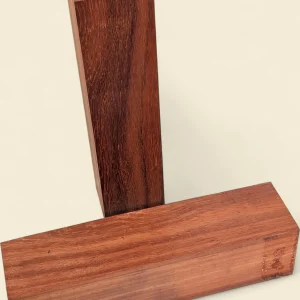 Padauk turning blank, 75 x 75 x 300mm square stock, on linen background