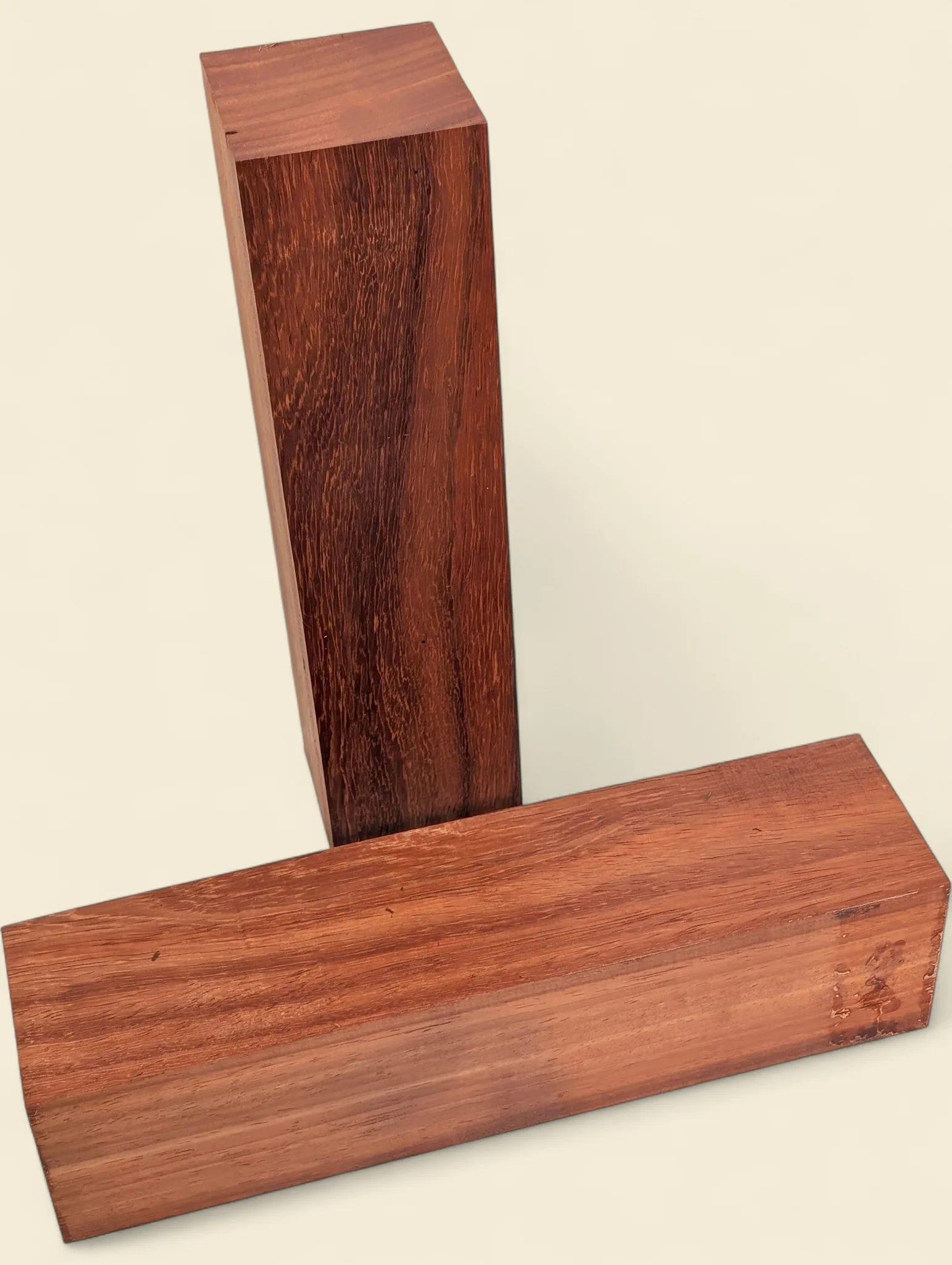 Padauk turning blank, 75 x 75 x 300mm square stock, on linen background