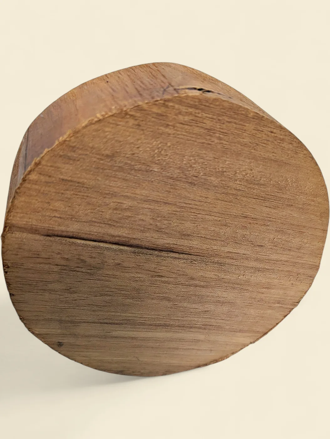 Queensland Maple bowl blank, 110mm diameter on linen backdrop - Trend Timbers Trend Reserve