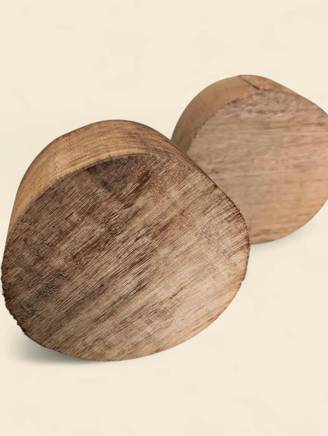 Rose Butternut bowl blank, 120mm diameter - face detail showing grain and figure, on linen backdrop