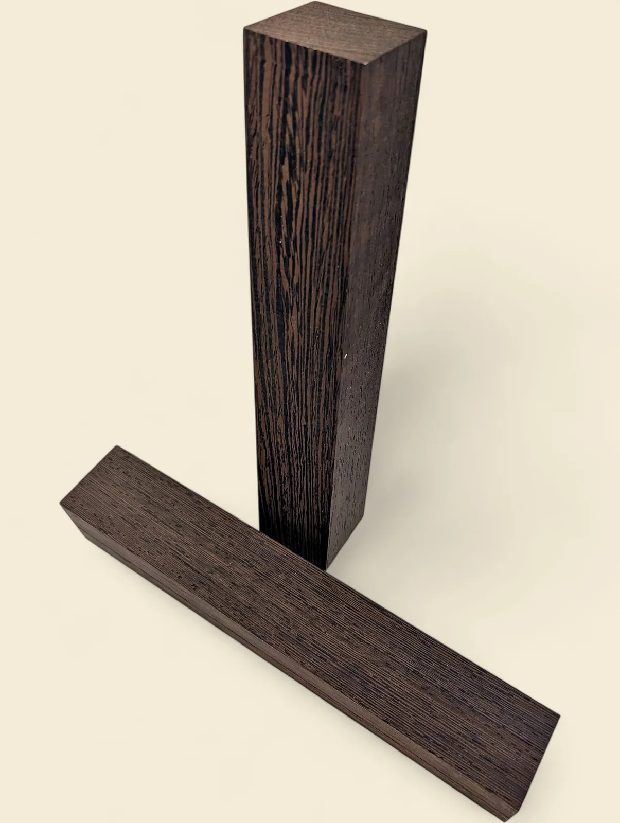 Wenge turning blanks, 50 x 50 x 300mm square spindle stock on linen background