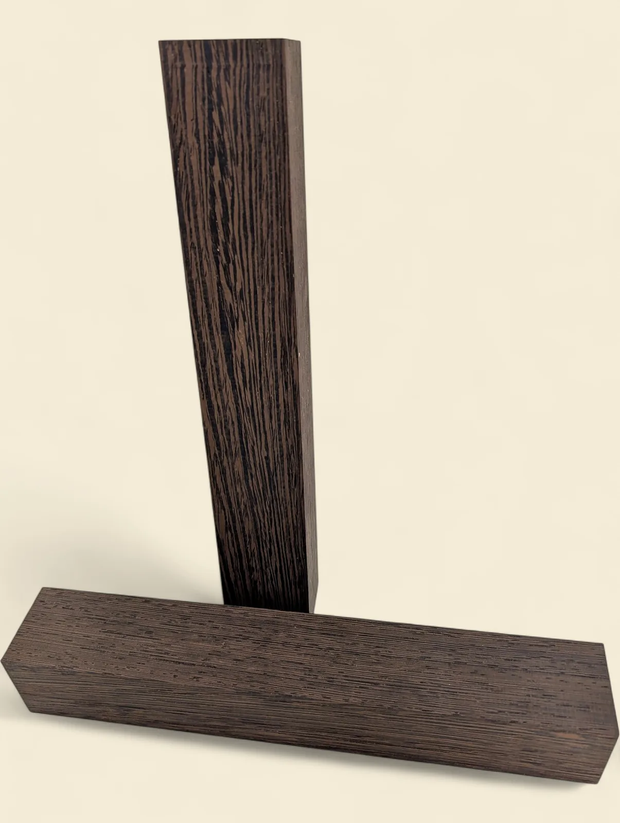 Wenge square spindle turning blanks on linen background