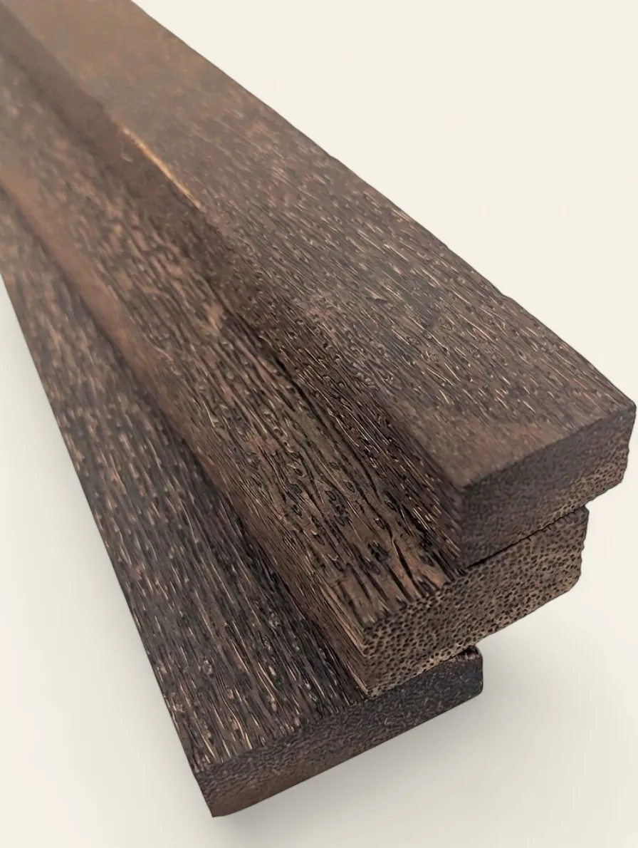 Black palm timber stock showing black-on-tan streaked figure