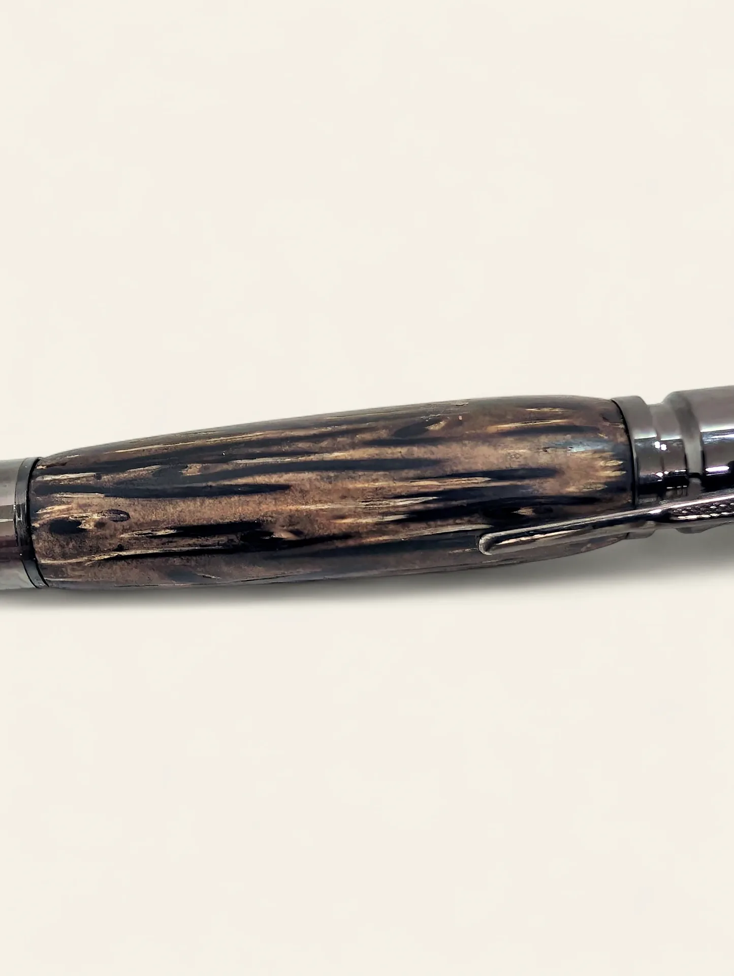 Close-up of black palm pen barrel figure