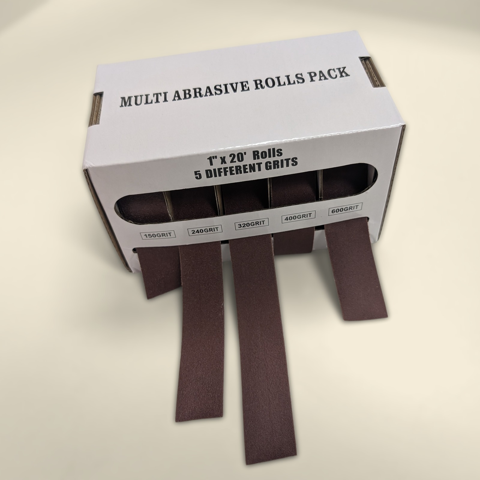 Dispenser box of five 25mm abrasive rolls, 150 to 600 grit, strips pulled out the front