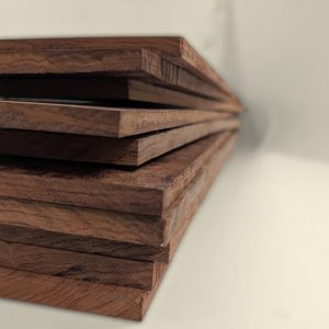 Stack of bubinga boxmaking boards showing movement after milling