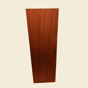 African Padauk dressed face on linen background; boards are supplied rough-sawn