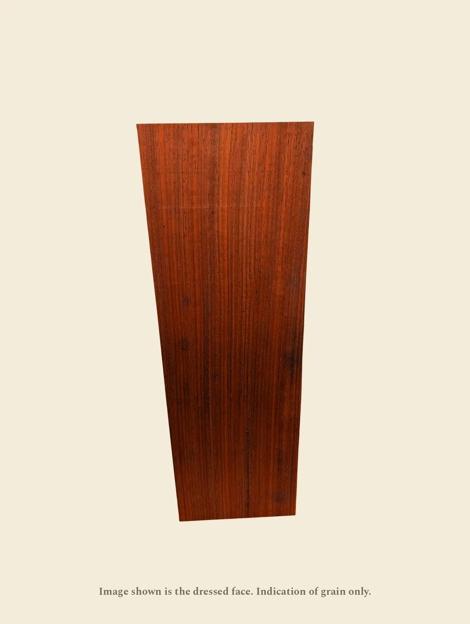 African Padauk dressed face on linen background; boards are supplied rough-sawn