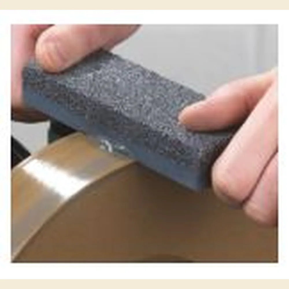 Record Power Stone Grader being run across the wheel of a WG250 wet stone sharpening system